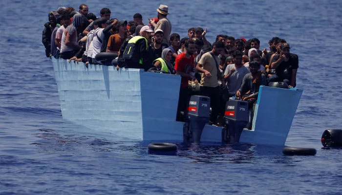 Asylum seekers and refugee seen in the Mediterranean sea. — Reuters/File