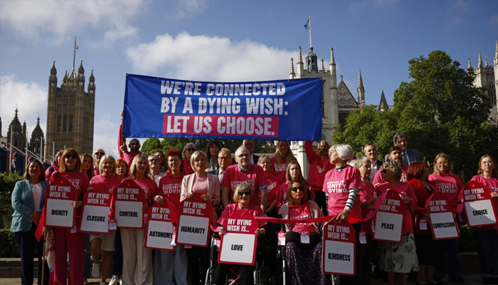 Pro-euthanasia campaigners seen outside parliament.— AFP/File