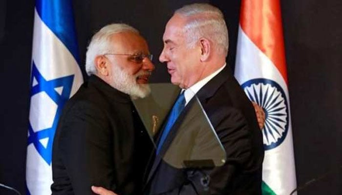 Indian Prime Minister Narendra Modi hugs with Israeli Prime Minister Benjamin Netanyahu as they deliver joint statements during an exchange of co-operation agreements ceremony in Jerusalem. &mdash; Reuters/File