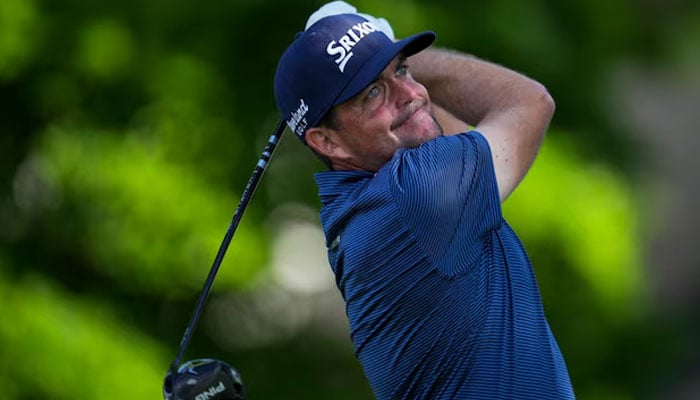 Keegan Bradley plays his shot from the 12th tee during the third round of the Rocket Mortgage Classic golf tournament. &mdash;Reuters/File