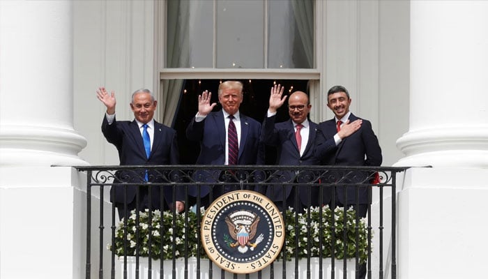 Israels Prime Minister Benjamin Netanyahu, U.S. President Donald Trump, Bahrains Foreign Minister Abdullatif Al Zayani and United Arab Emirates (UAE) Foreign Minister Abdullah bin Zayed wave from the White House balcony, September 15. &mdash; Reuters