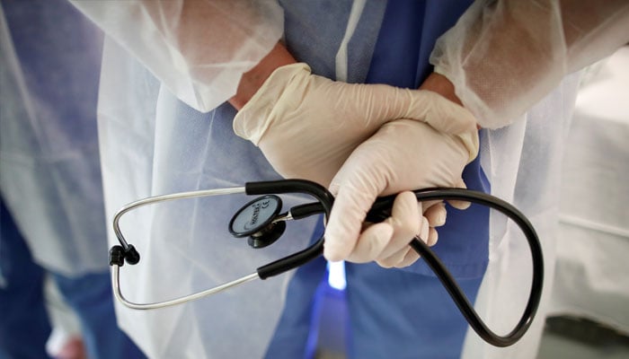 A doctor holds a stethoscope in a file photo. &mdash; Reuters/File