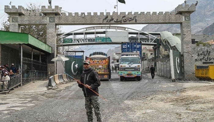 In this picture taken on February 2, 2023, a Pakistan border policeman is pictured from the zero point Torkham border crossing between Afghanistan and Pakistan, in Nangarhar province. &mdash; AFP