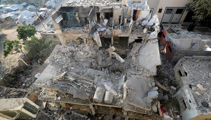 Debris lies at the site of an overnight Israeli air strike on a house, in Gaza City, July 23, 2025. — Reuters