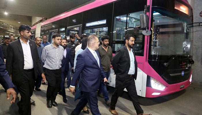 Sindh senior minister Sharjeel Inam Memon inspects and reviews the pink buses during the inauguration of pink buses for women on the Green Line track, at Numaish Intersection in Karachi on November 19, 2025. — PPI