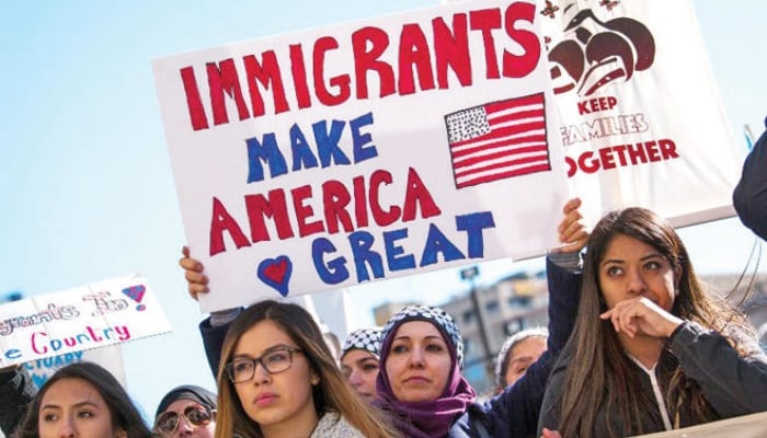 Protesters gather at the Milwaukee County Courthouse where they attend a rally against President Donald Trump’s policy on immigration, on February 13, 2025. — AFP/File