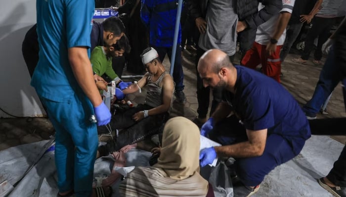 An injured Palestinian receives treatment following an Israeli air strike, according to medics, at Al-Ahli Arab Hospital in Gaza City November 19, 2025.  — Reuters/