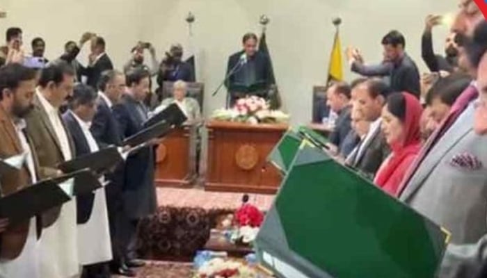The image shows the oath-taking ceremony of the Azad Jammu and Kashmir (AJK) cabinet. &mdash; APP/File