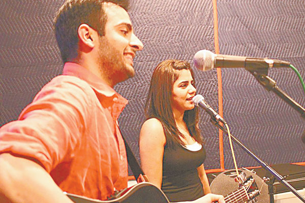 Naqsh vocalist Daksh Kubba, seen here with singer-songwriter Quratulain Balouch (QB).