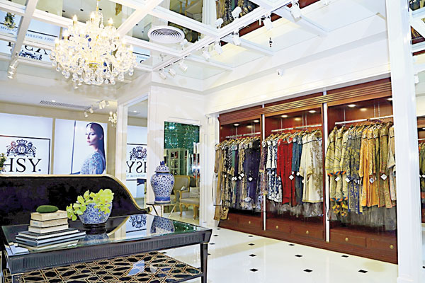 The store features a wide range of formal and luxury clothing that the brand is known for.