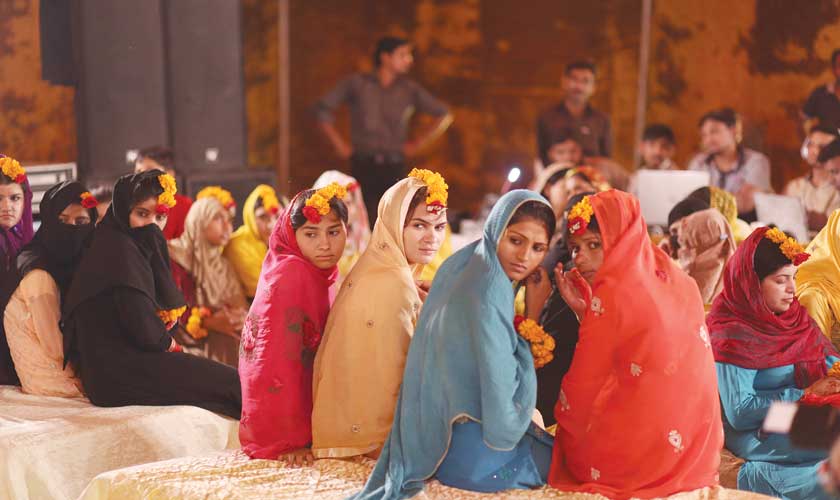 The brides-to-be at their mehendi ceremony...