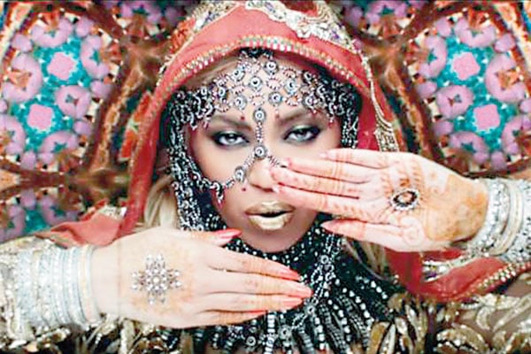 Beyonce wearing Abu Jani Sandeep Khosla in Coldplay ‘Hymn For The Weekend’.