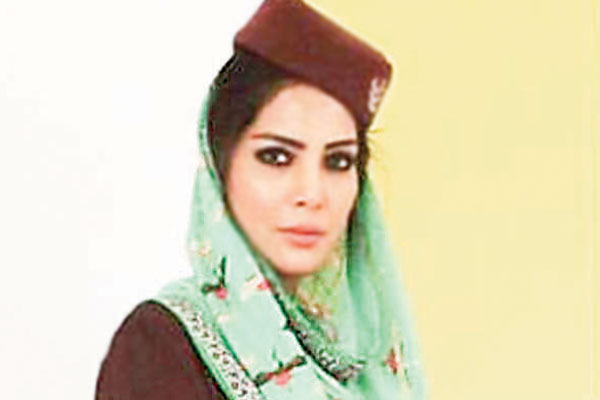 Fashion model Saima Azhar poses in the new uniform, which will be seen on the new PIA Premiere Service.