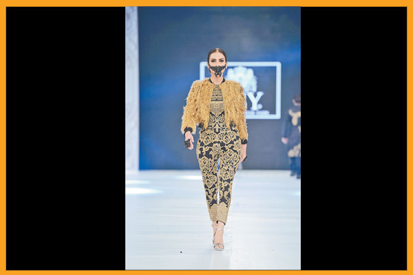 HSY opened the show with dramatic flair and showcased a collection that reflected innovation, invention and change.
