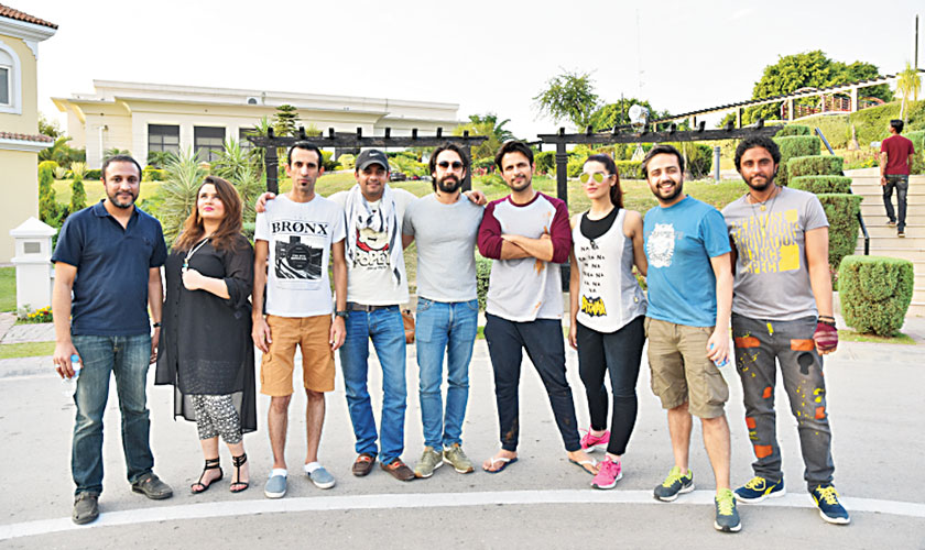 Faiza Saleem, Hareem Farooq and Ali Rehman Khan with the cast and crew of Parchi, an upcoming gangster-comedy film.