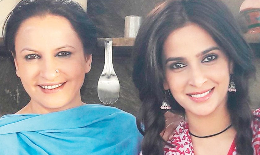 Behind the scenes: Saba Qamar as the free spirited Fauzia Batool with Saba Faisal (left) as her conservative mother in new drama serial, Baaghi that is inspired from the life of social media sensation Qandeel Baloch.