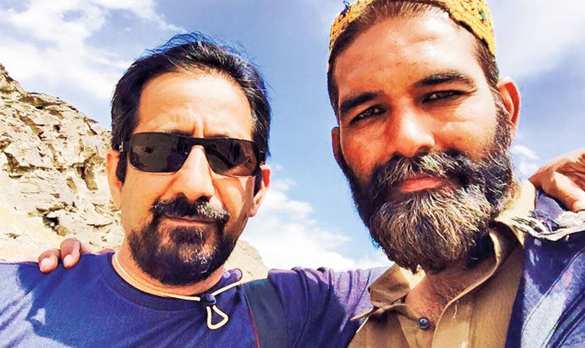 Writer/co-producer Mashood Qadri (left) in a bts image from the set of Saawan. Seen here with the actor who plays Saawan’s father in the film.