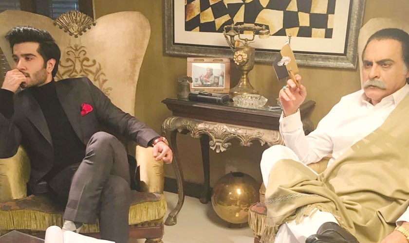 Feroze Khan as Hadi and Mehmood Aslam as his father, who is a politician, in a still from Khaani.