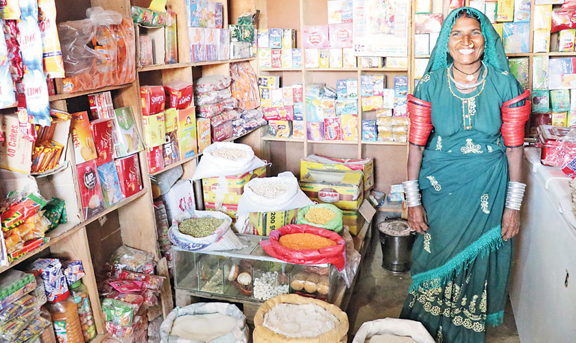 Resham at the small store that she operates