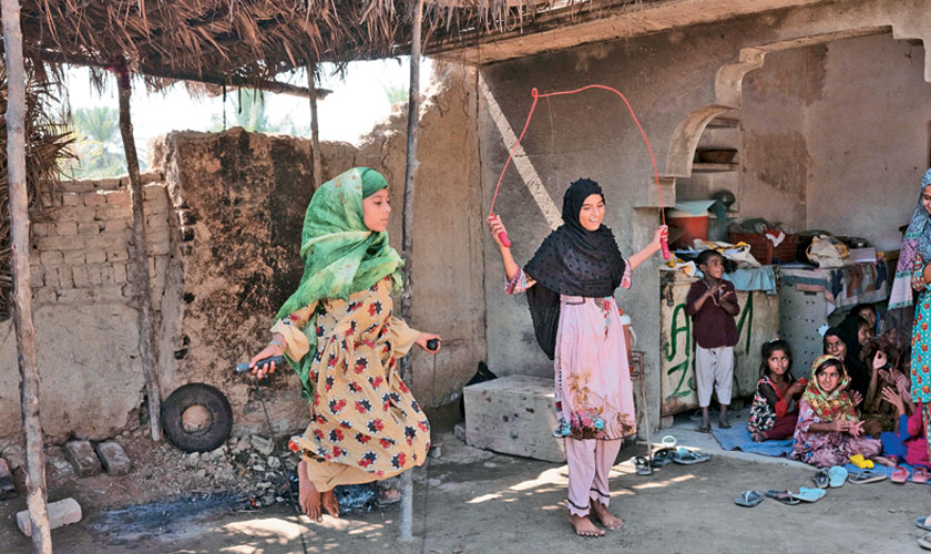 Mahera, 12, skips a rope after a session at the Mobile Safe Space where activities have gone on for 10 days. Her school was damaged in the floods and has been closed ever since.