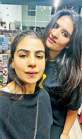 Naidah with fitness trainer, Maryam