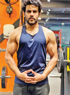 Muzammil, strength training coach