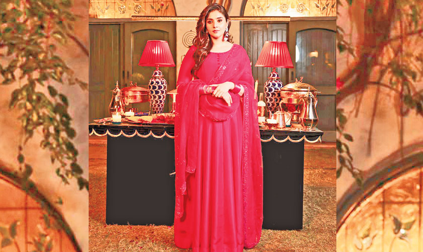 This kalidaar captures a feminine, romantic vibe. This stunning costume, made of pure silk, is your ideal opportunity to appear and feel put together with no effort! On the front and back necklines, as well as the sleek luxurious sleeves, the bright fuchsia pink raw silk is hand encrusted with sparkling crystals and sequins. The lovely pink statement dupatta with sequin embroidery lends a very stunning touch to your overall look.