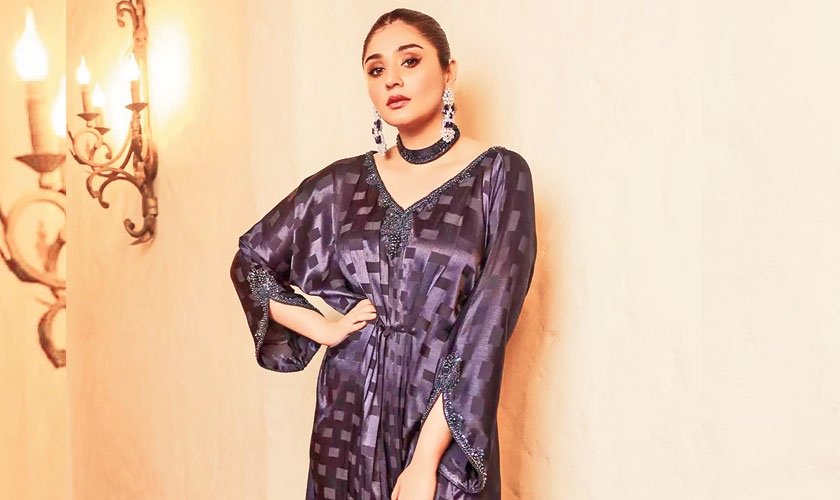 This magnificent kaftan just exudes opulence. Cut from pure silk and embellished with delicate hand decorations and sequins down the neckline, this gorgeous statement collar has crystal embellishments and buttons at the back of the neck. A floor-length gown with a flattering neckline and slits. This chic silhouette is a must-have for your festive Eid wardrobe.