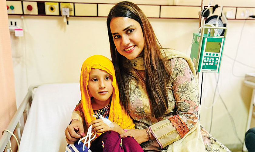 Fariha with a cancer patient