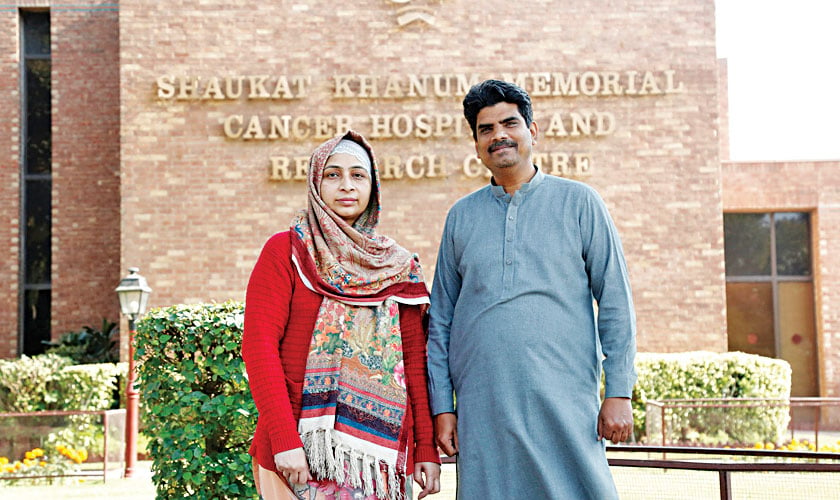 Nabila with her husband after a radiation session