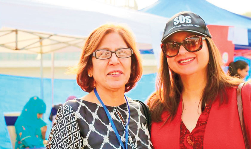 Saba with Ms Almas, Village Director, Lahore