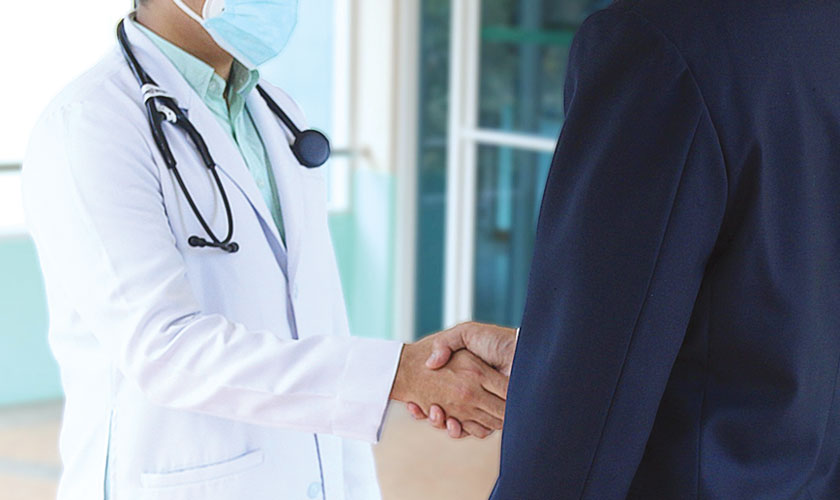 White coat, red hands