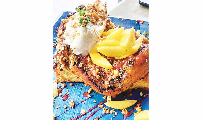 Thick Brioche French Toast with seasonal fruits and cream