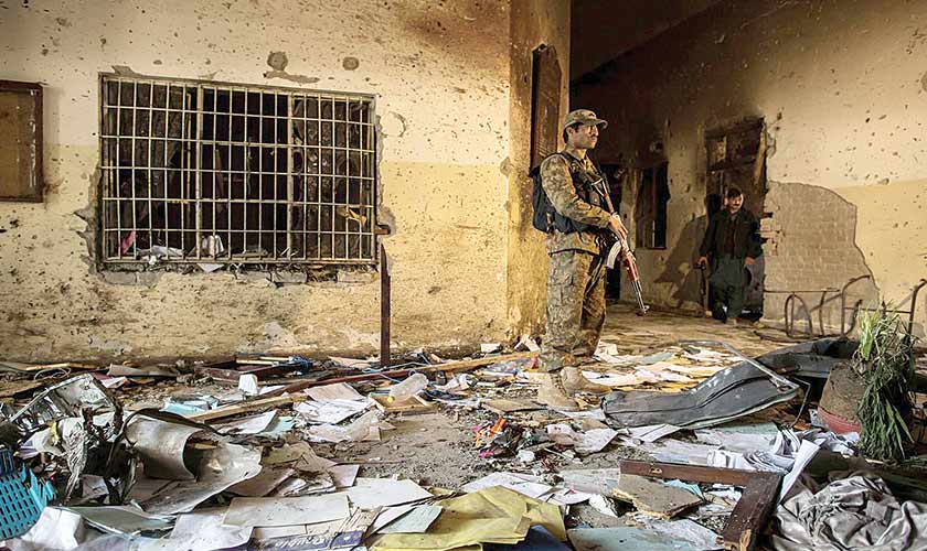 An army soldier stands inside the Army Public School, Peshawar following the attack in December 2014. — Photo courtesy: Reuters