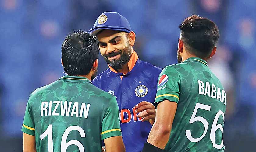Indian skipper Virat Kohli greets Pakistans Mohammad Rizwan and Babar Azam after T20 World Cup match. -File photo