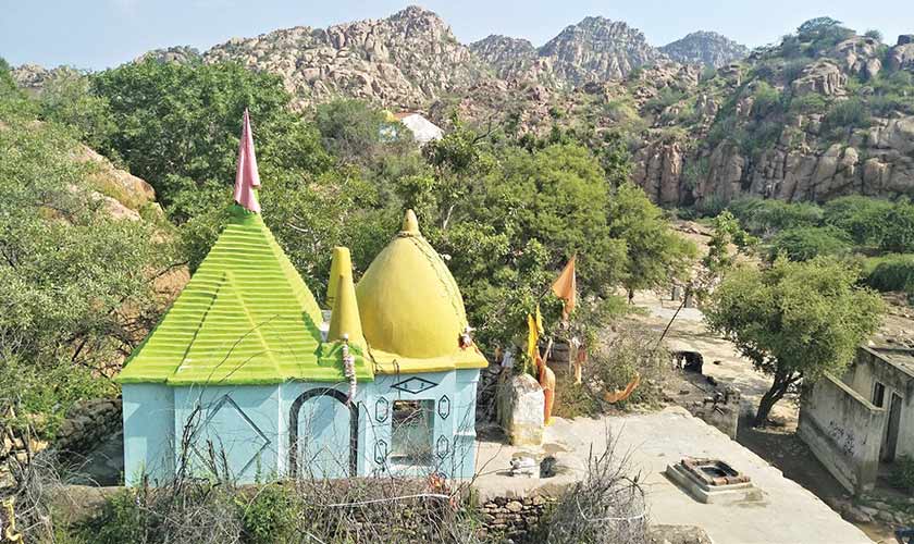 The Shiva temple with Karoonjhar hills in the background.