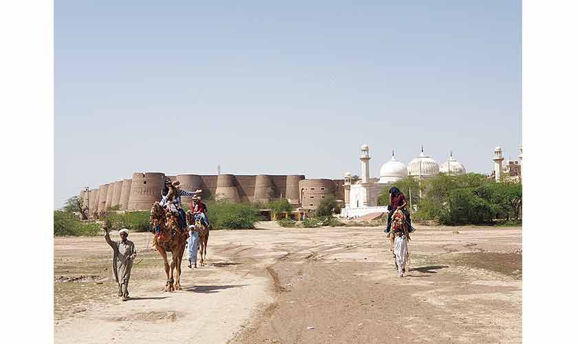 Camel ride with the backdrop of Derawar Fort and Abbasi Masjid