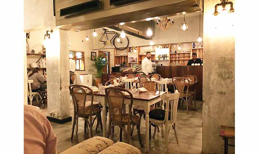 Cote Rotie’s bike-on-the-wall is a bit inexplicable, but the space is inherently pretty, and pleasantly done up.