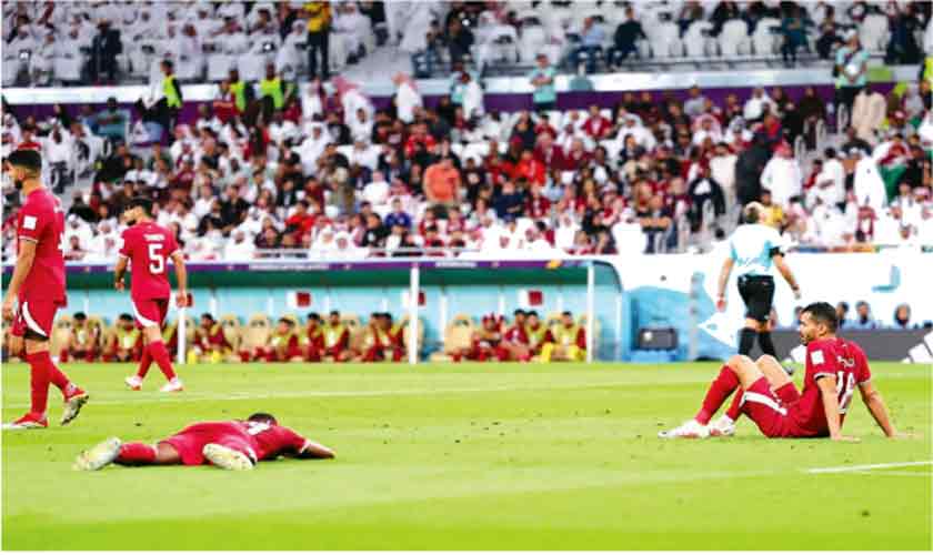 Qatar knocked out of World Cup as England made to wait