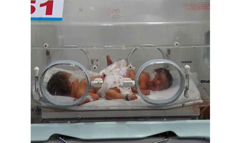 Two children in an incubator at the Lady Reading Hospital in Peshawar.