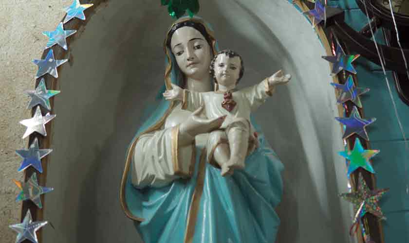 Veneration: Iconography of the Virgin and Child at St. Fidelis Catholic Church in Faisalabad.