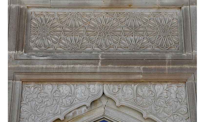 Geometric and floral designs on facade of the Jamia mosque Suriali.