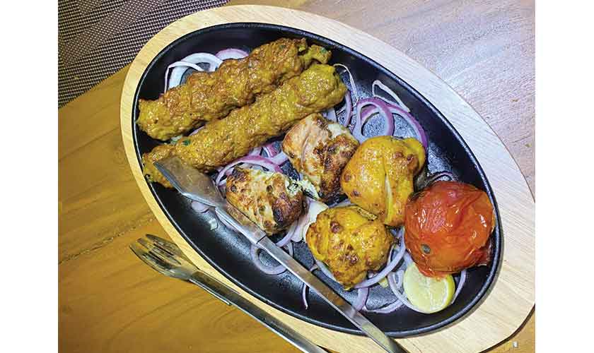 The Personal Barbecue Platter features succulent kebabs, tender tikka and juicy boti.