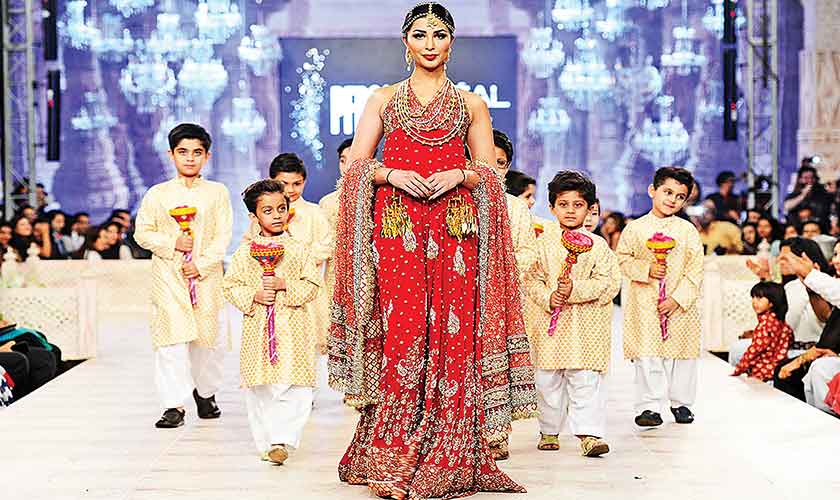 Karma’s display at PFDC Bridal Week 2014 proved a clean runway with more action on stage was the best formula.