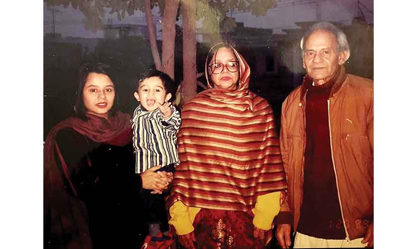 The writer (as a kid) in the lap of his late mother,nani, and nana, the famous Urdu writer A Hameed.— Image: Supplied