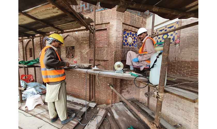 Restoration work is underway at Lahore Fort’s Picture Wall. — Photos: Courtesy of WCLA