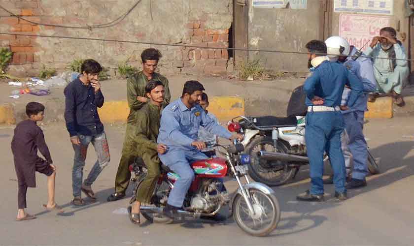 Instead of apprehending the teenage drivers and lodging FIRs against them, the police could have fined them or impounded their motorbikes/ cars.— Photo by Rahat Dar