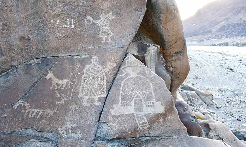 A Buddhist monk before stupa at Chilas II rock art site.