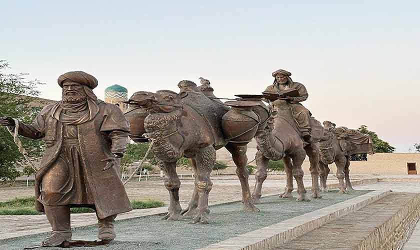 Camel caravan outside the walls of Itchan Kala.