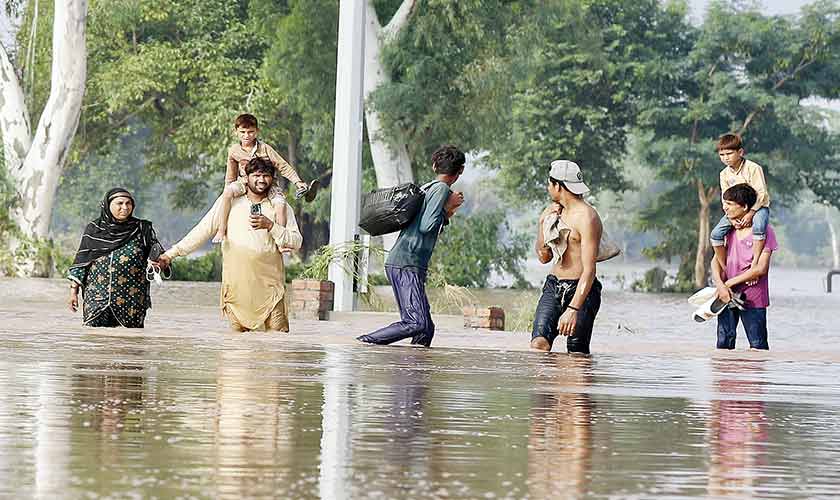 Many displaced families, in a rush to evacuate, were unable to pack their clothes or blankets. Sort the clothes for men and women separately and pack them in plastic to ensure they remain dry and usable. — Photos by Rahat Dar